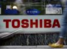 Toshiba posts net loss, plans restructuring to put scandal behind it