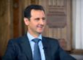 U.S. says Assad must go, timing down to negotiation