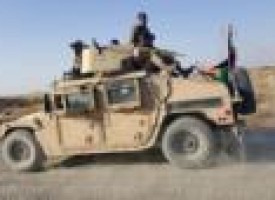 Taliban hold out in northern Afghan city, district in northeast falls