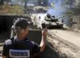 Ukraine starts pull-back of tanks, light artillery in east: military