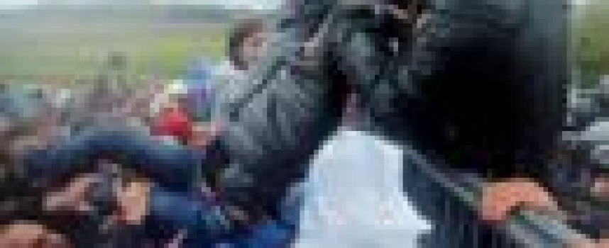 Backlog of migrants swells in the Balkans, tempers fray