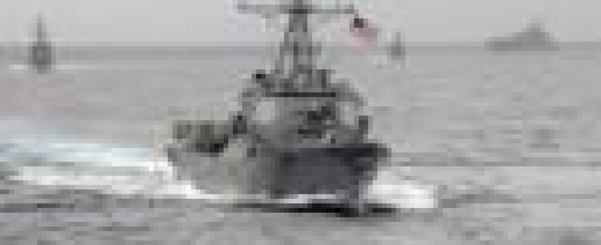 Angry China says shadowed U.S. warship near man-made islands in disputed sea