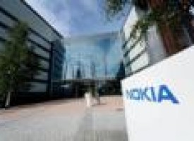 Nokia beats estimates and returns cash, Alcatel deal on track